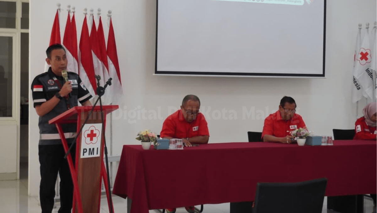 Penyampaian laporan Ketua Panitia Pelatihan Ambulans PMI Kecamatan Tarogong Kidul